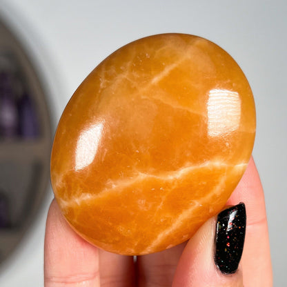 Orange Calcite Palm Stone