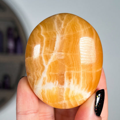 Orange Calcite Palm Stone